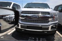 MIAMI, FL - MAY 10:  Ford F-150 pickup trucks are seen on a sales lot on May 10, 2018 in Miami, Florida. The company announced it is suspending production of its F-150 trucks after a fire at a supplier's facility caused it to run out of some parts needed in the production of the truck.  (Photo by Joe Raedle/Getty Images)