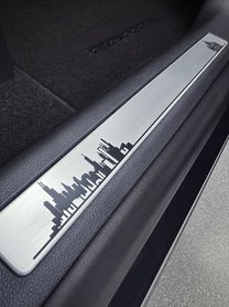 And engravings of the Chicago skyline and St. Peter’s Basilica adorn the scuff plates, representing Leo XIV’s journey to the Vatican.