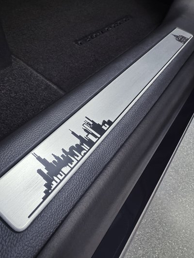 And engravings of the Chicago skyline and St. Peter’s Basilica adorn the scuff plates, representing Leo XIV’s journey to the Vatican.