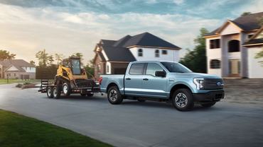 2022 Ford F-150 Lightning Pro. Pre-production model with available features shown. Available starting spring 2022. Max towing varies based on cargo, vehicle configuration, accessories and number of passengers.